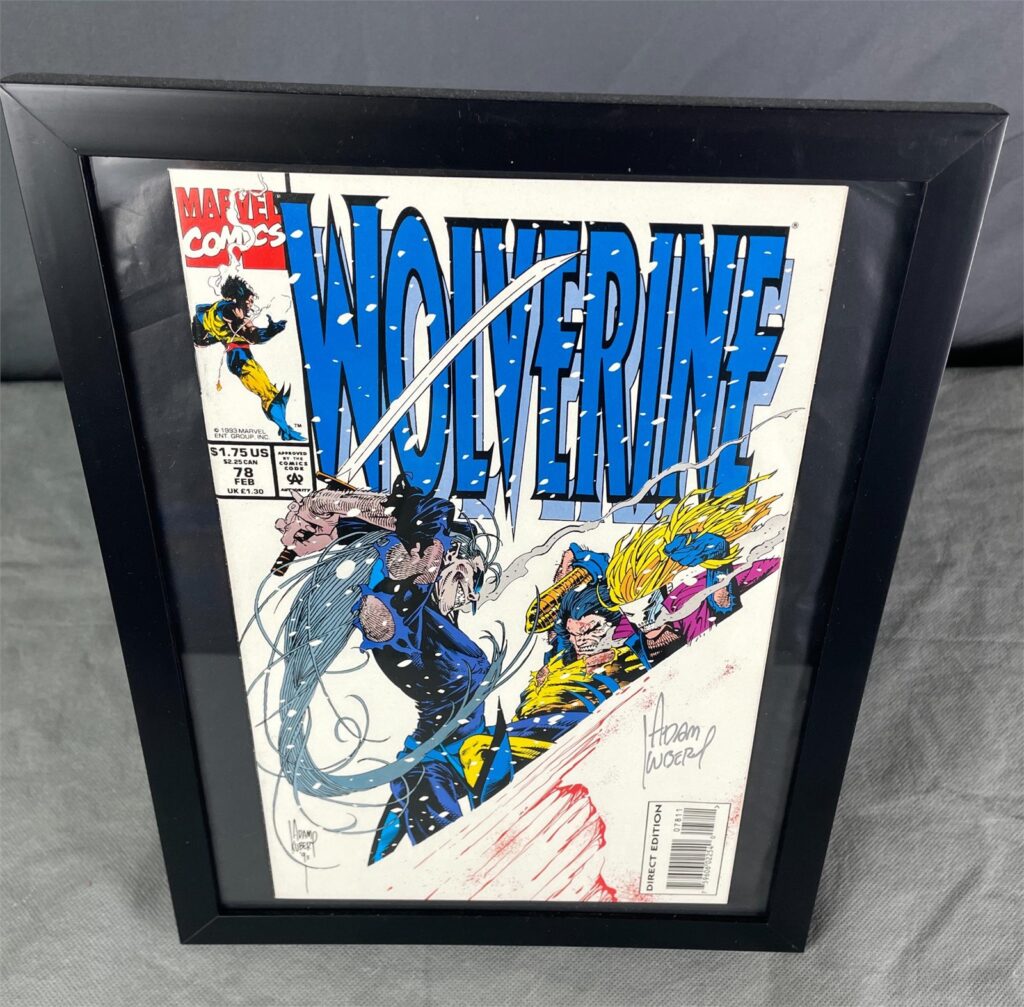 Framed Wolverine comic book sold at auction
